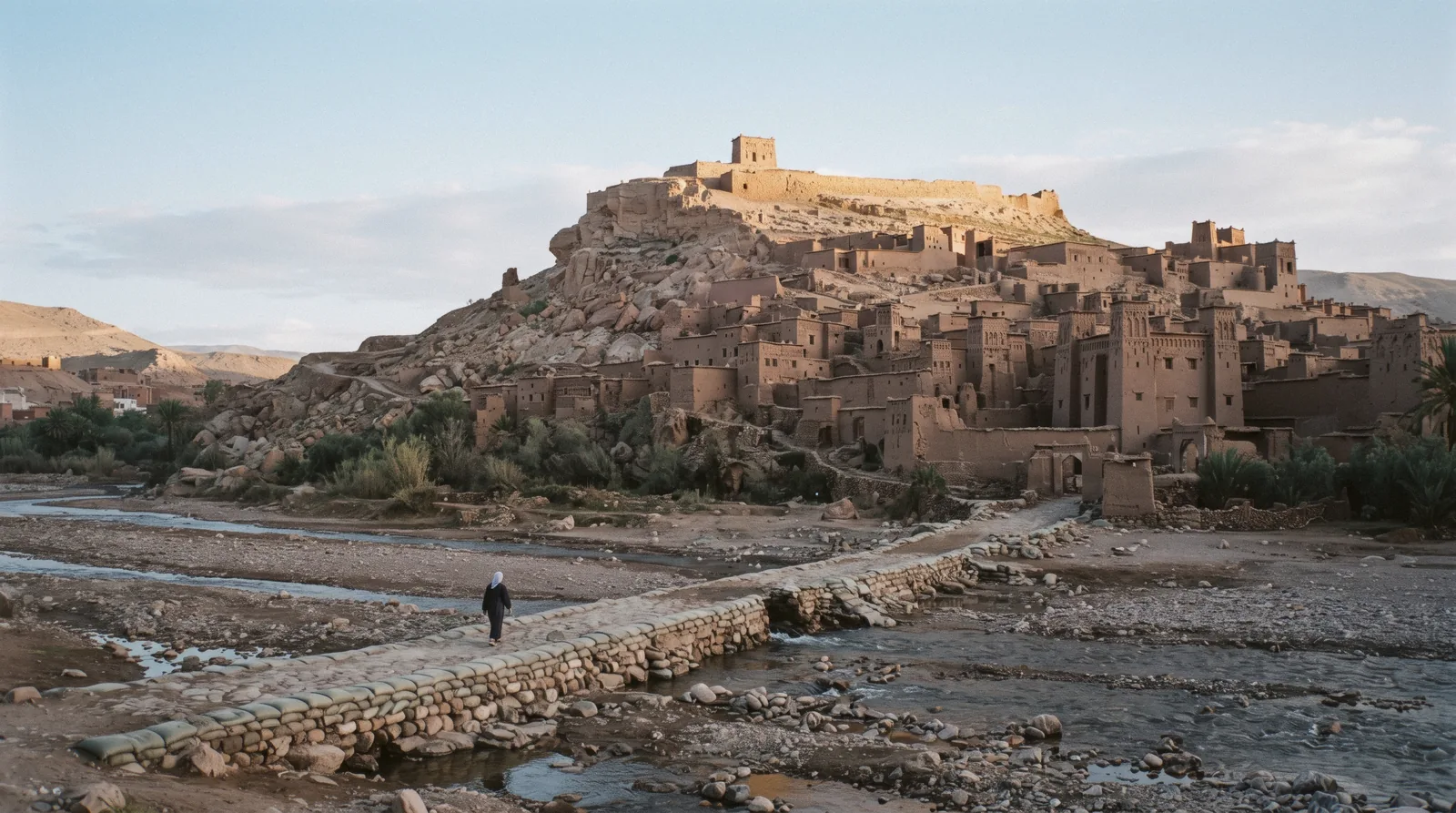 The earthen ksar stacked up its hillside above the dry Ounila riverbed on an Ait Ben Haddou day trip from Marrakech