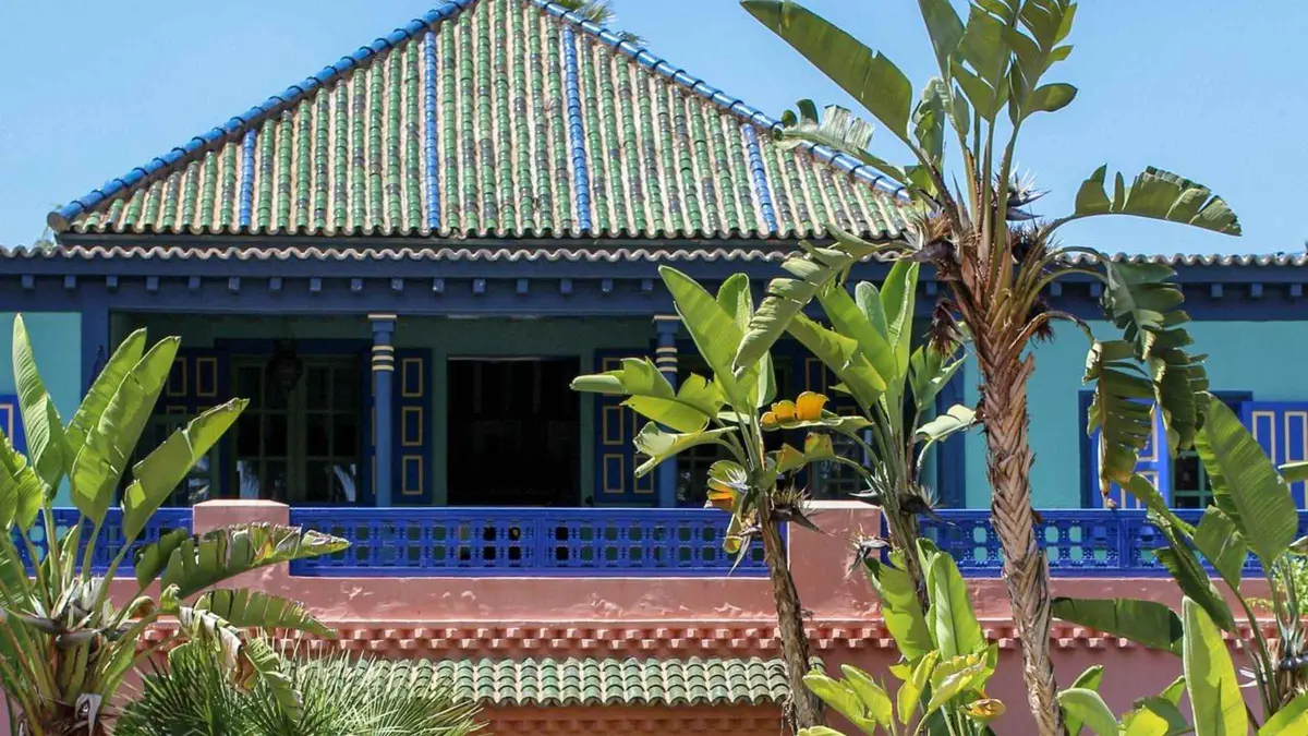 Cobalt-blue villa and bamboo grove in Jardin Majorelle on a Jardin Majorelle entry ticket visit in Marrakech