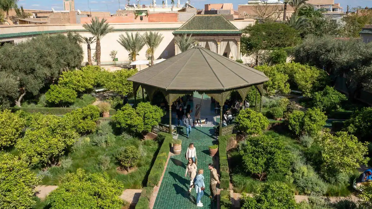 Water channel and clipped hedges in the Islamic garden of Le Jardin Secret on a Le Jardin Secret and Ben Youssef Medersa tour in Marrakech