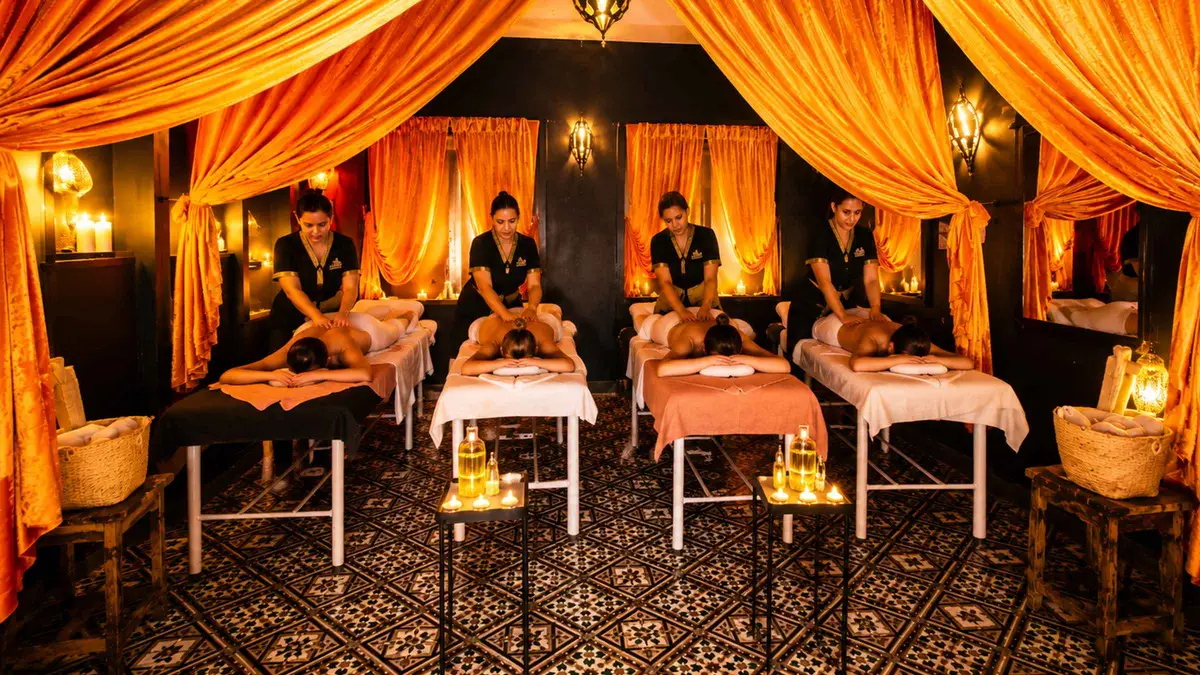 Steam room with tadelakt walls and marble slab at a traditional hammam on a Marrakech hammam and spa visit